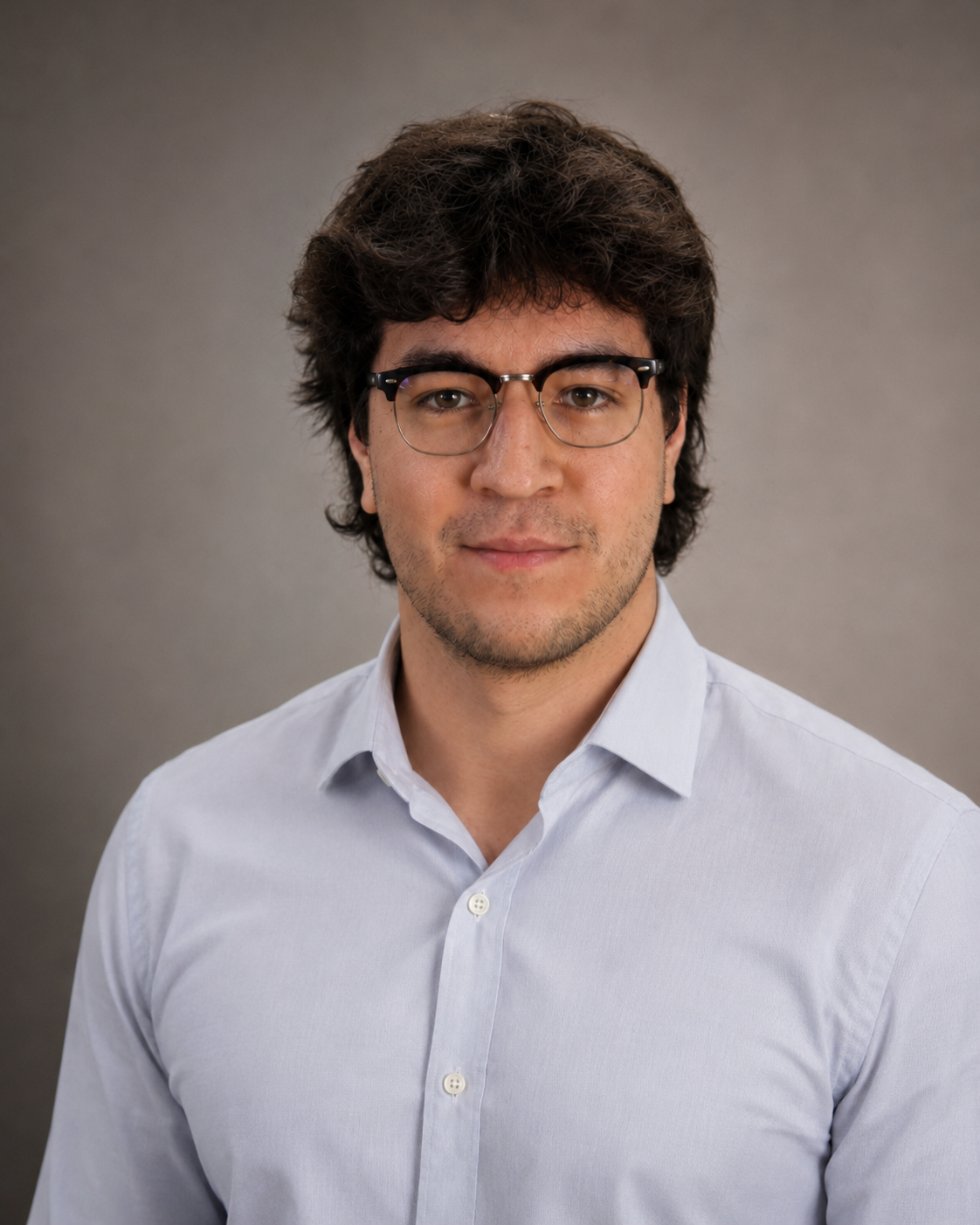 Professional headshot of Julian Arceo